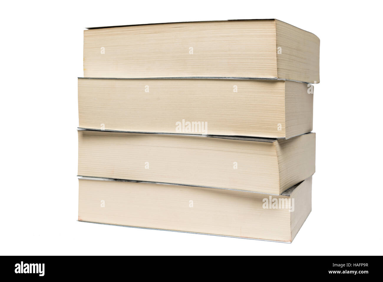 Stack of old paperback books isolated on a white background Stock Photo