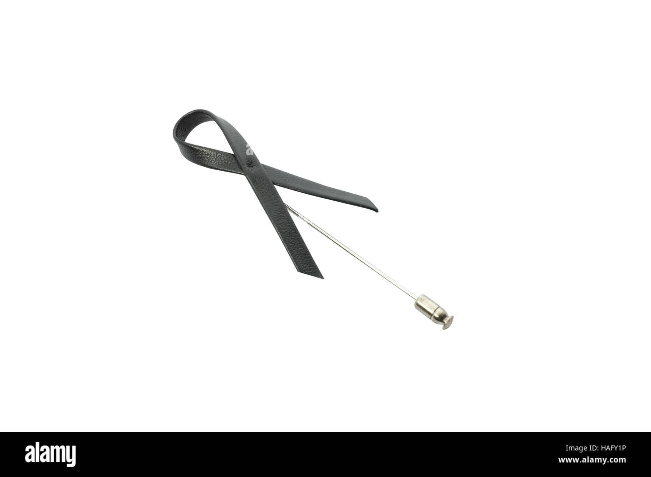 Brooch black ribbon leather on white background . melanoma awareness ...
