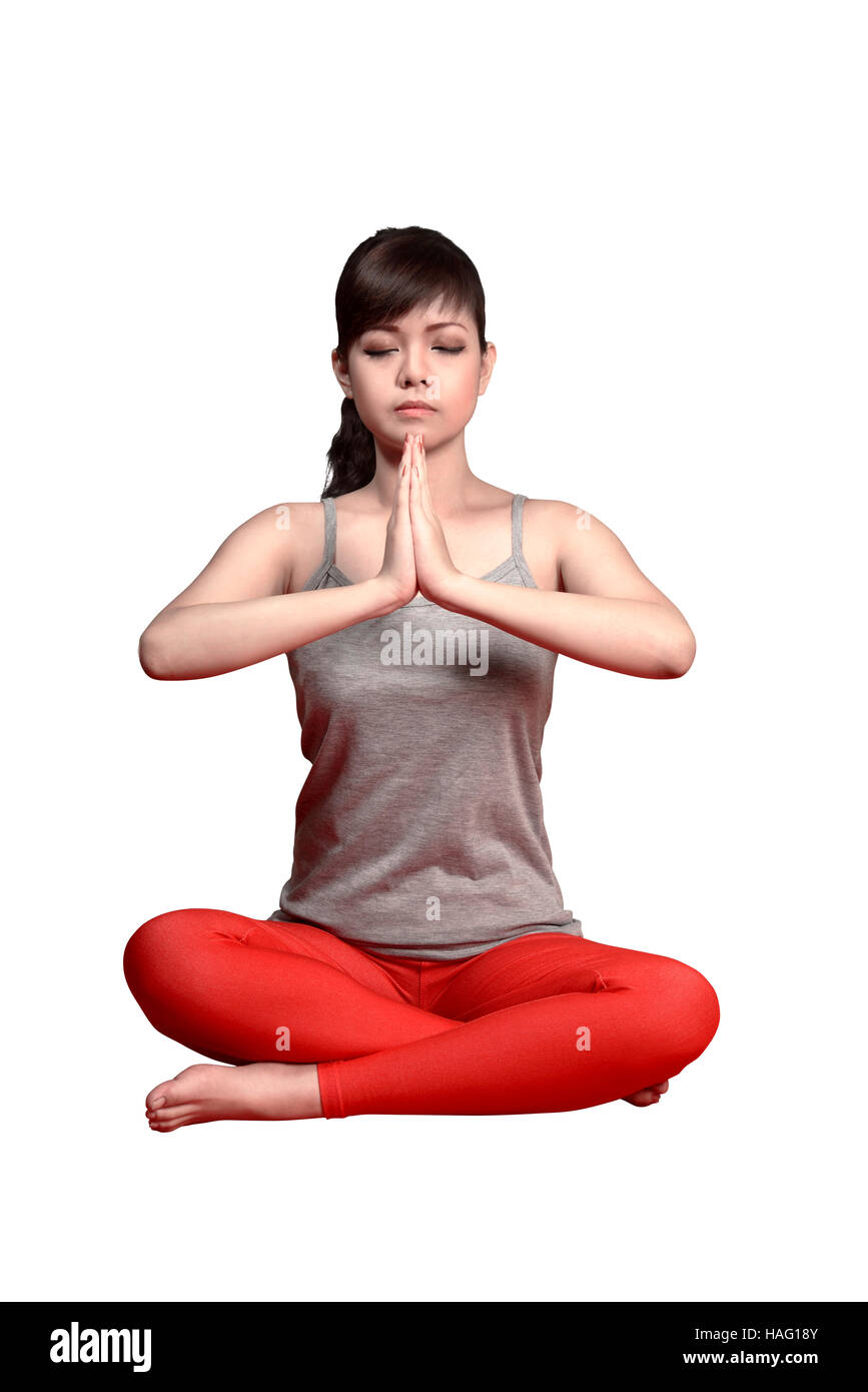Asian woman doing yoga isolated over white background Stock Photo - Alamy