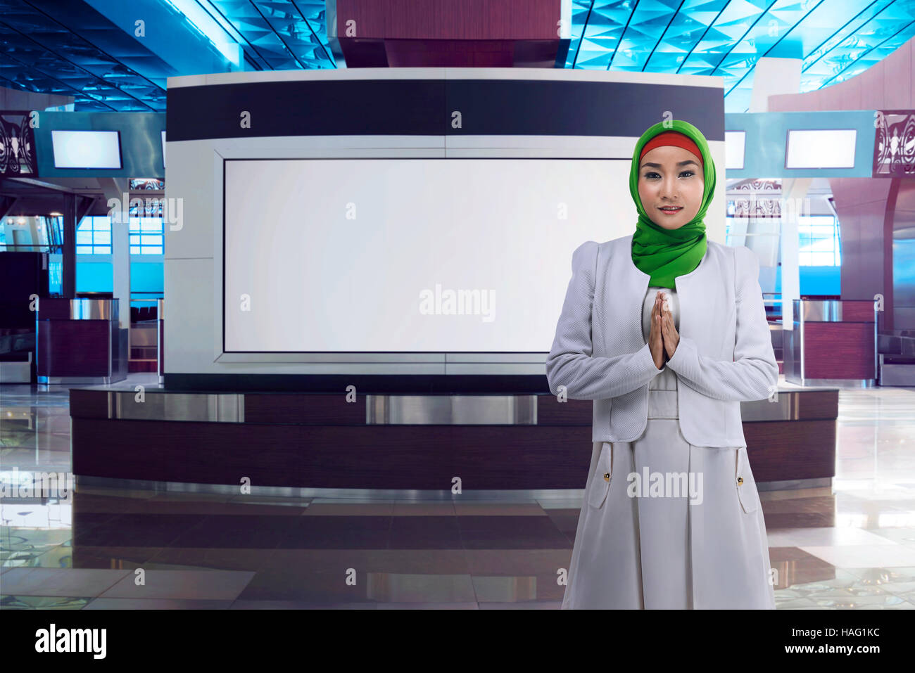 Young asian muslim woman wearing hijab on airport lobby, gorgeous woman ...