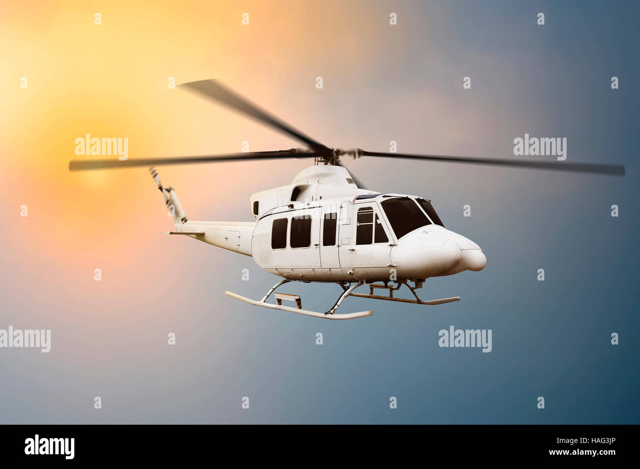 Transport helicopter flying on the sky when sunset Stock Photo Alamy