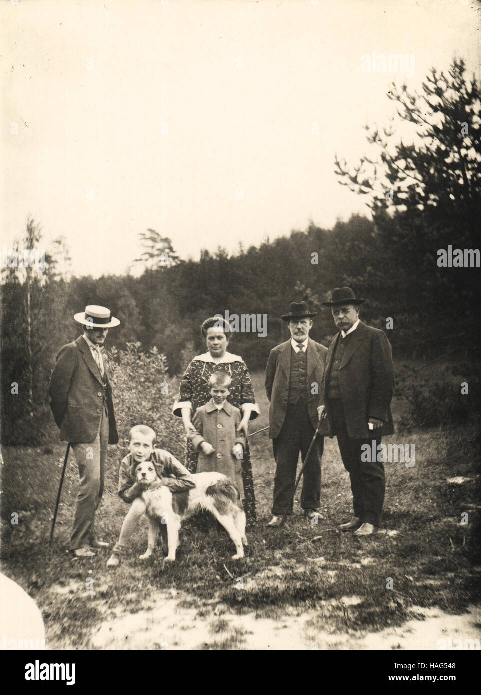 Group portrait of a Russian family  with a hound on a walk in the countryside, pre-revolutionary period in Russia, 1910- Stock Photo