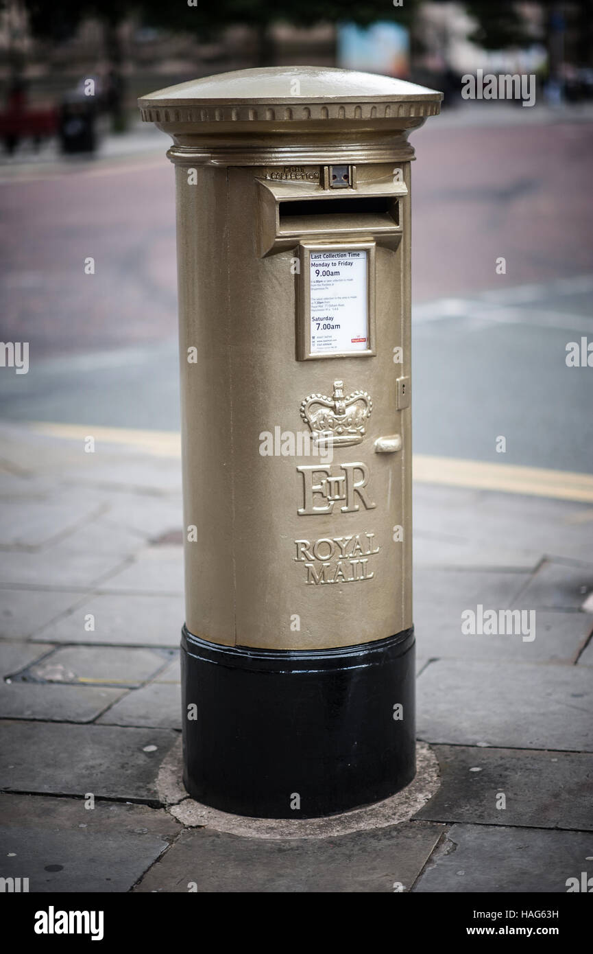 Gold Post Box Stock Photo - Alamy