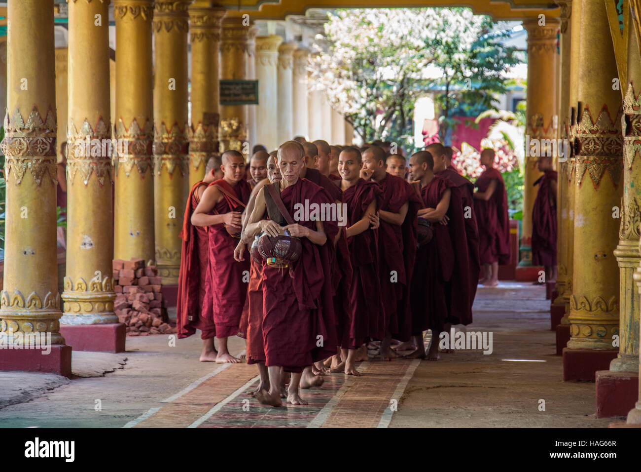 Group of monks at the Kyat Khat Wine Monastery in Bago near Yangon in Myanmar (Burma). Stock Photo