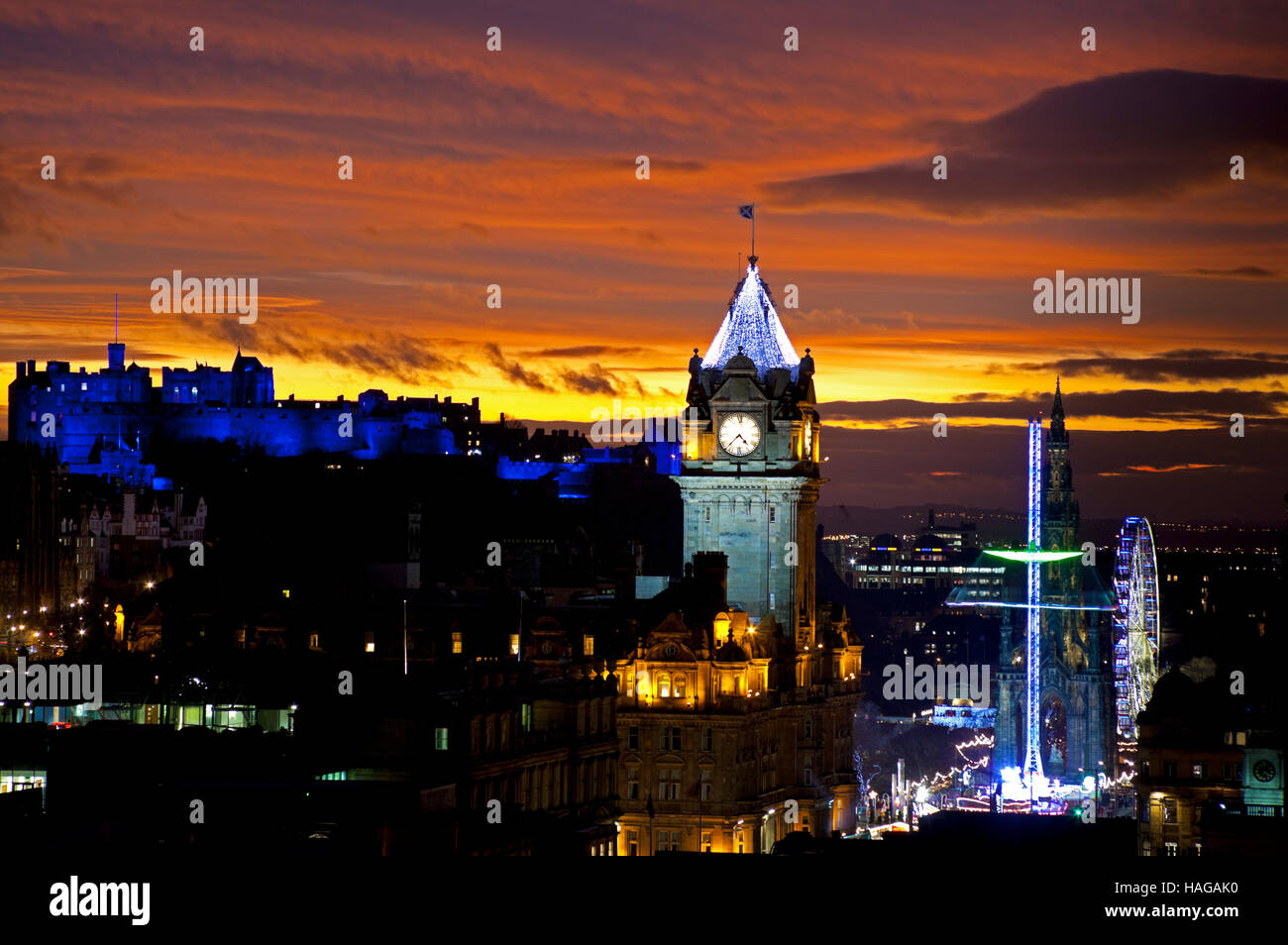 Edinburgh city from Calton Hill, Scotland. 30th Nov, 2016. St Andrew's Day is the national day in Scotland. Historic buildings such as the castle were bathed in a blue hue, plus a spectacular sunset. Stock Photo