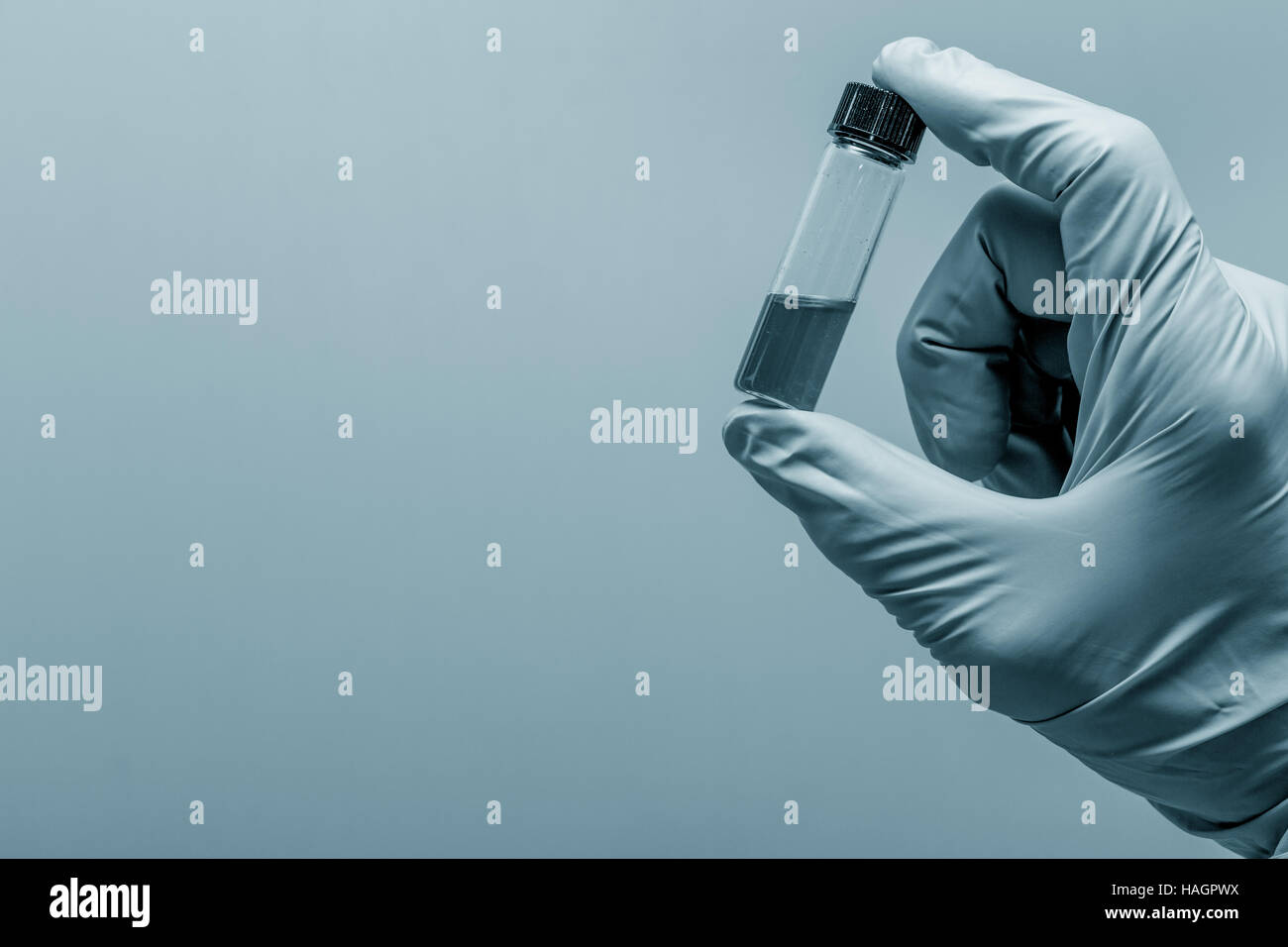 test tube vial in hand Stock Photo Alamy