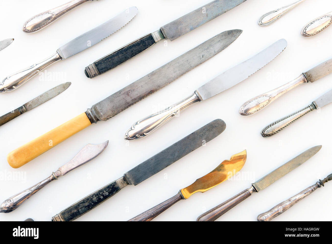 various old knifes on white background - knife set Stock Photo