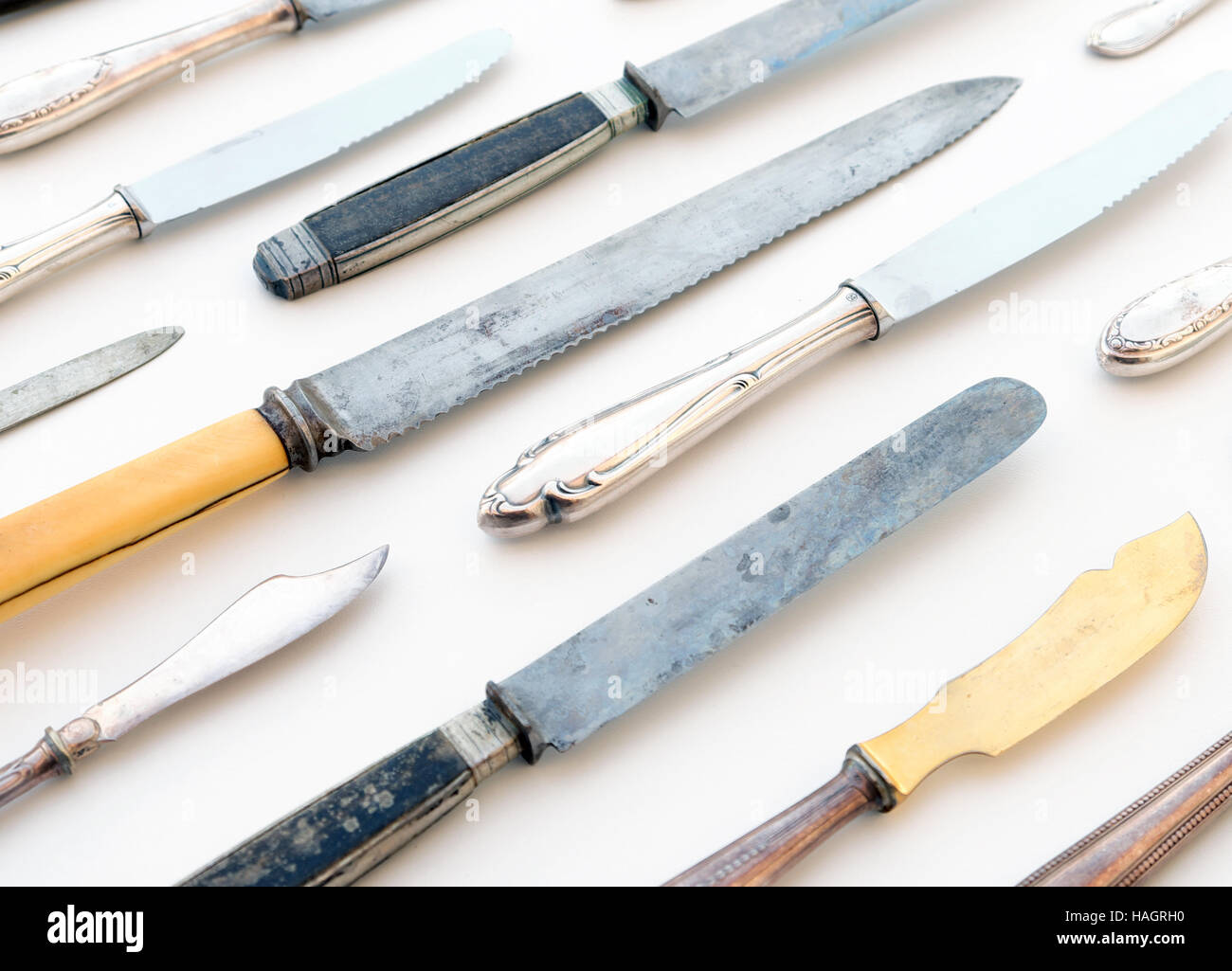 beautiful old knifes on white background - retro knife set Stock Photo