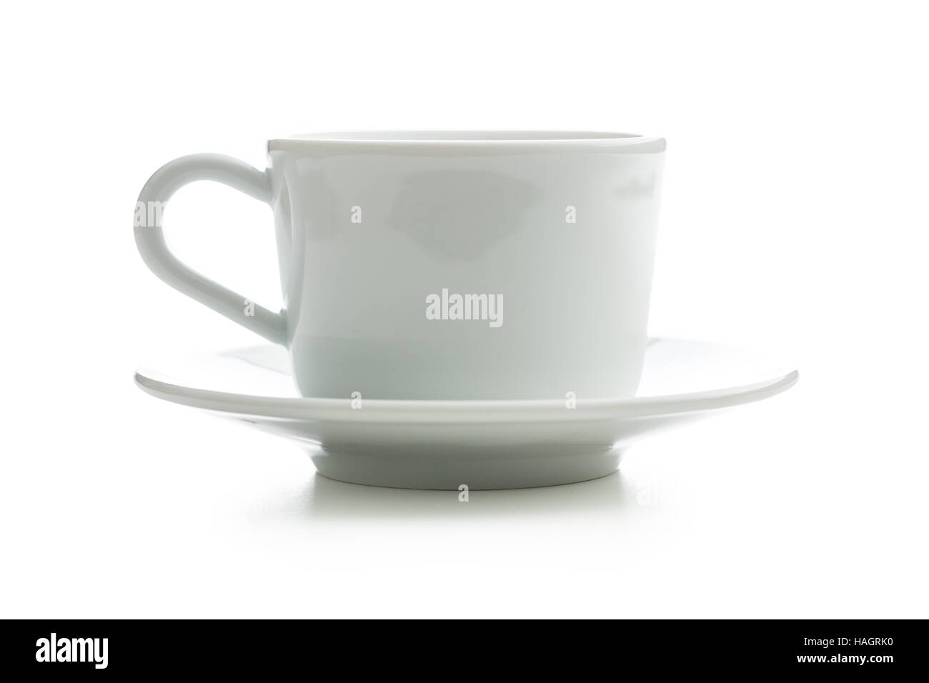 White cup with saucer isolated on white background Stock Photo - Alamy