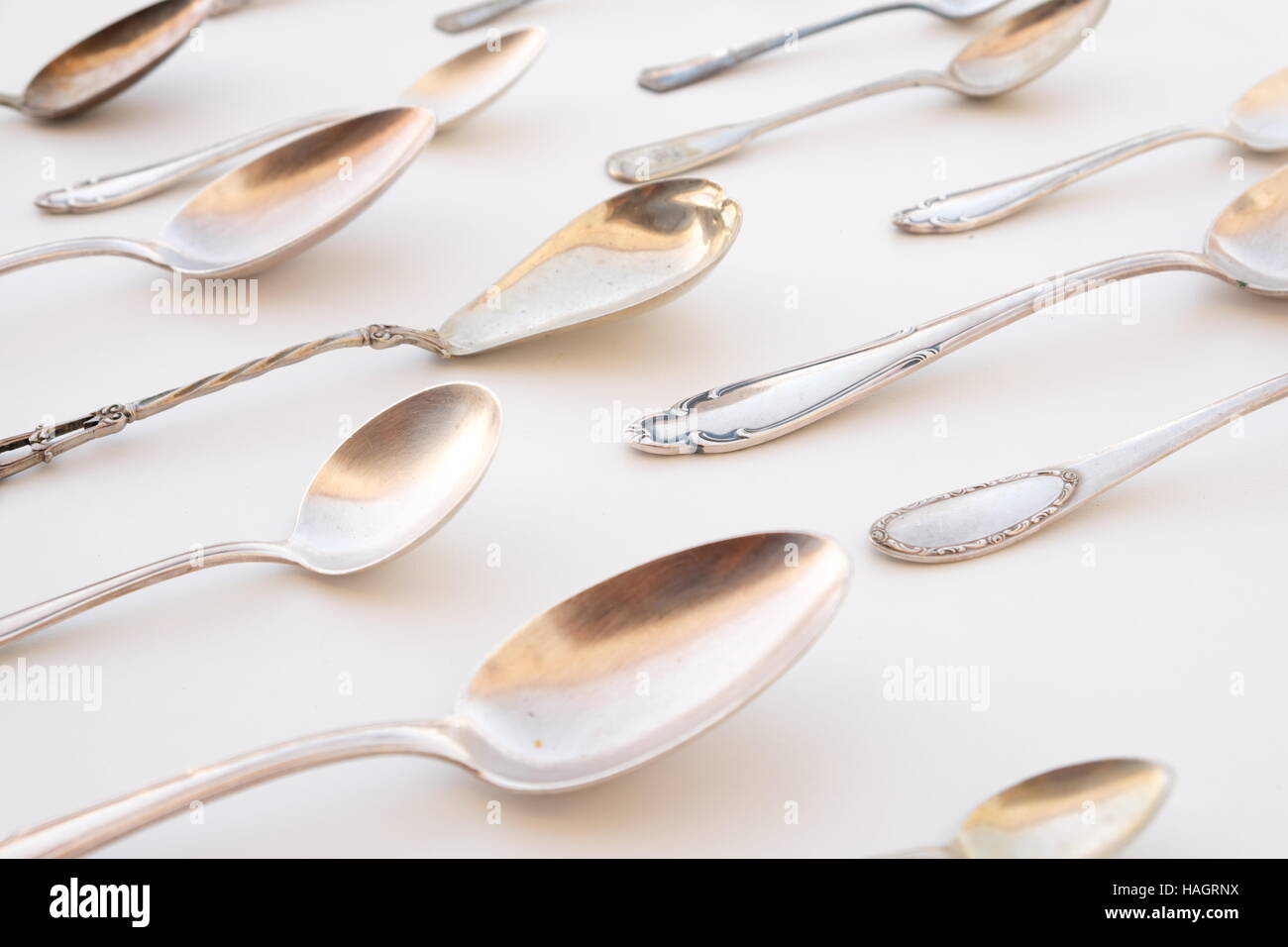 beautiful cutlery pattern - golden spoon, silver spoons Stock Photo