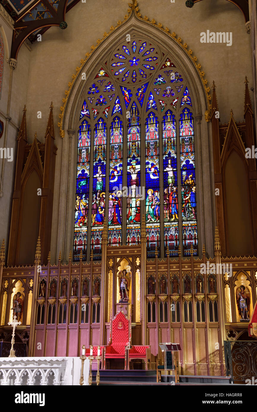 Renovated apostle statues and stained glass window of St Michael's
