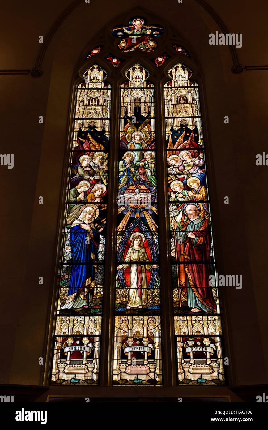 Renovated stained glass window of the Holy Family at St Michael's Cathedral Basilica Toronto Stock Photo