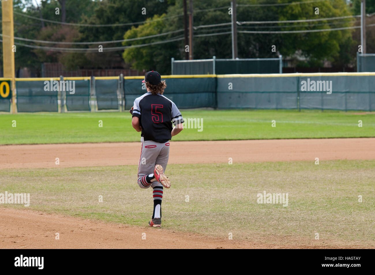 Teen baseball boy running base hires stock photography and images Alamy