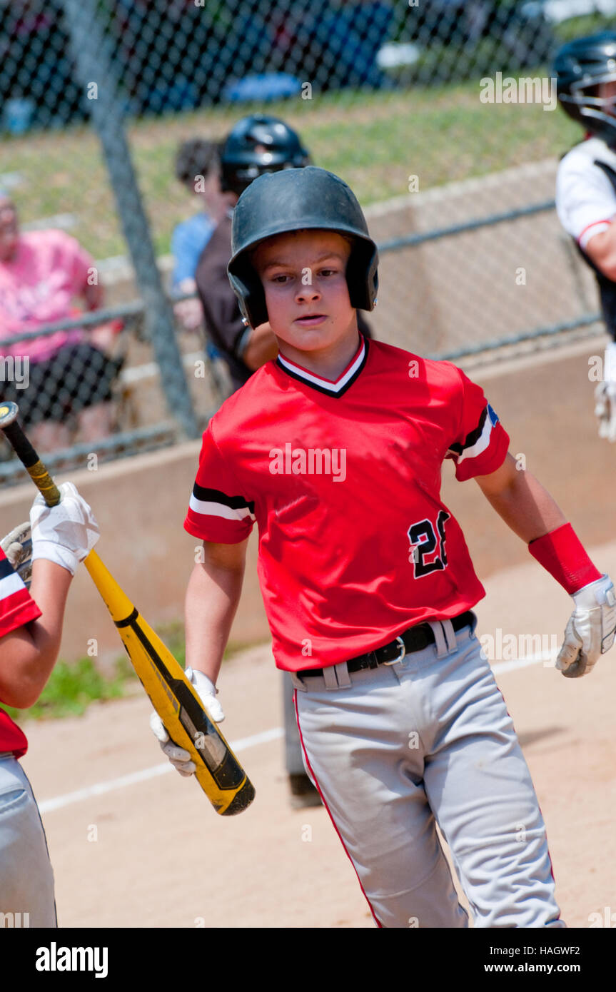 Teen baseball boy running base hires stock photography and images Alamy