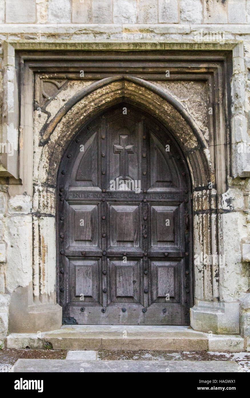 Carved Wooden Arched door on a old English church Stock Photo