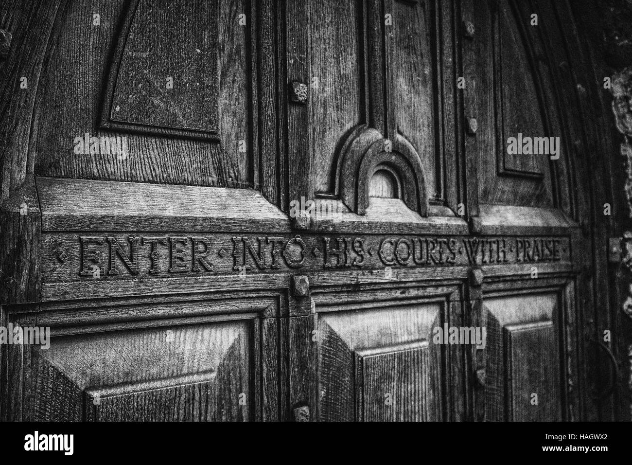 Carved Wooden door on a old English church Stock Photo