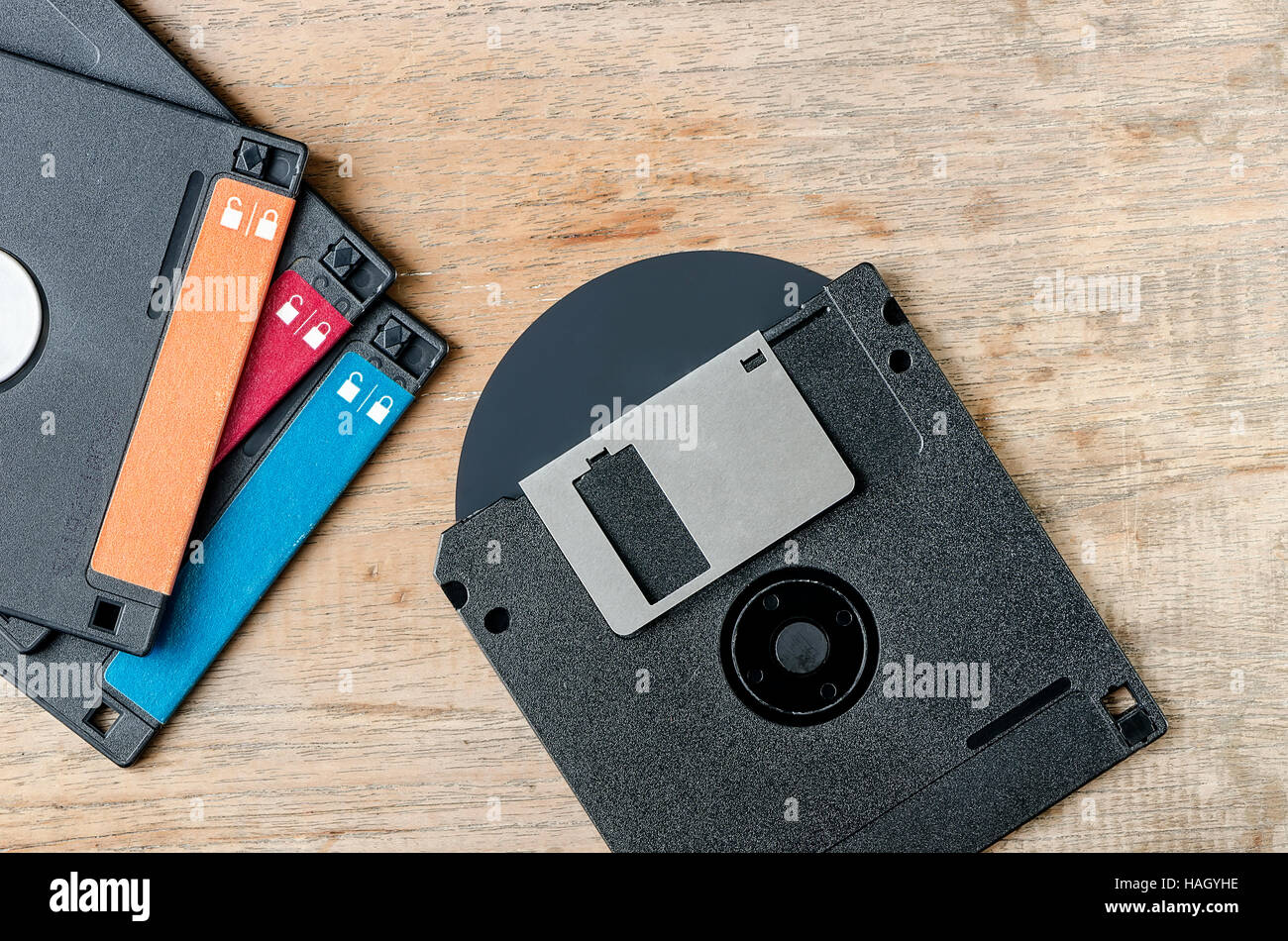 Used floppy diskettes on wooden background Stock Photo Alamy