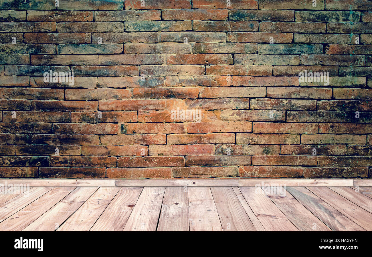 old  brick wall l and wooden floor Stock Photo
