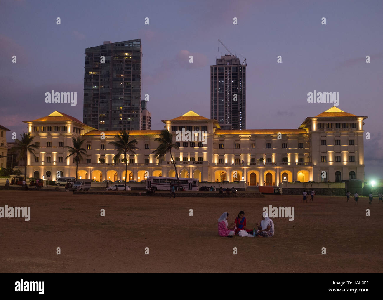Frontage of the Galle Face hotel and Galle Face Green in the evening, Colombo, Sri Lanka, Stock Photo