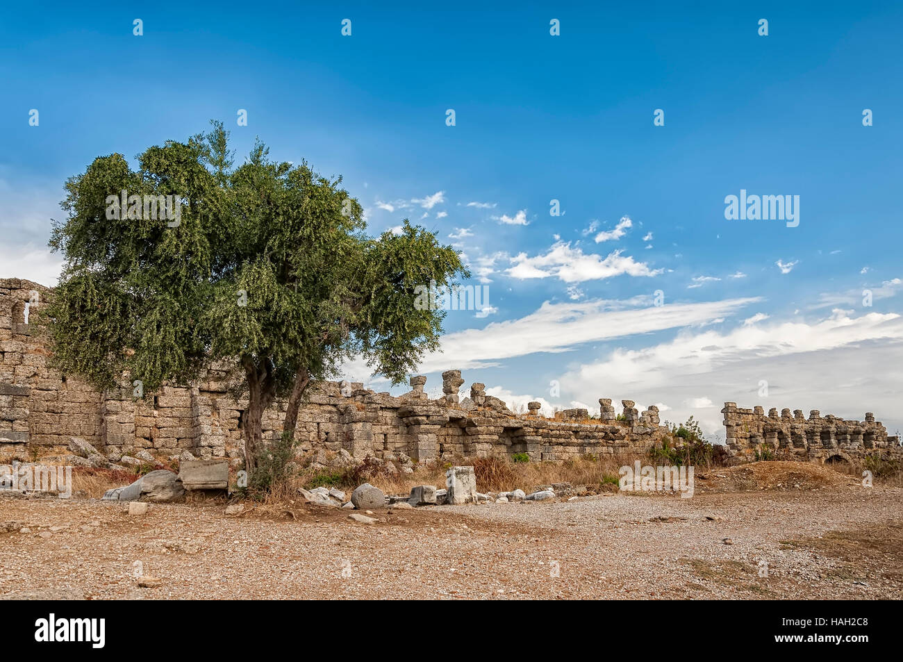 Part of the ancient city wall ruins that surround the town of Side in Turkey. Stock Photo