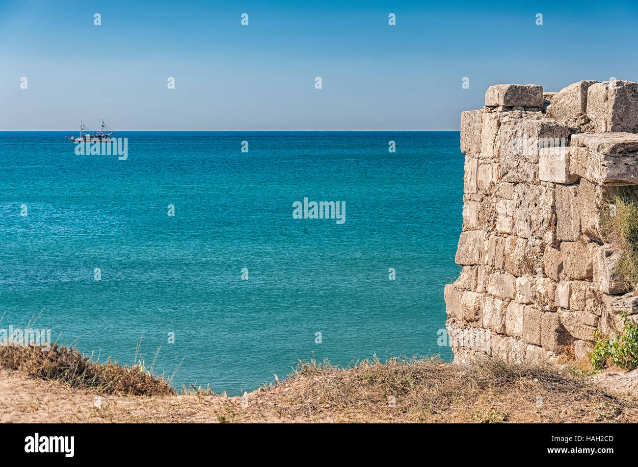 Part of the ancient city wall ruins that surround the town of Side in Turkey. Stock Photo