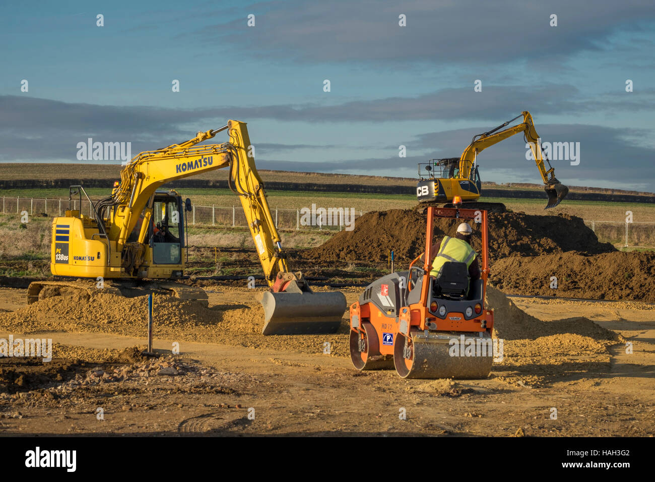 Heavy machinery being used for preparation for house building, Grantham, Lincolnshire, England, UK Stock Photo