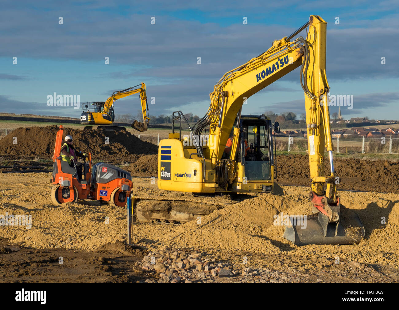 Heavy machinery being used for preparation for house building, Grantham, Lincolnshire, England, UK Stock Photo