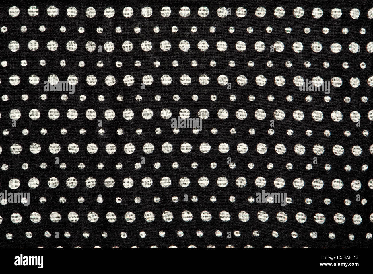 closeup of black and white printed cotton fabric, textile with dotted design, pattern Stock Photo