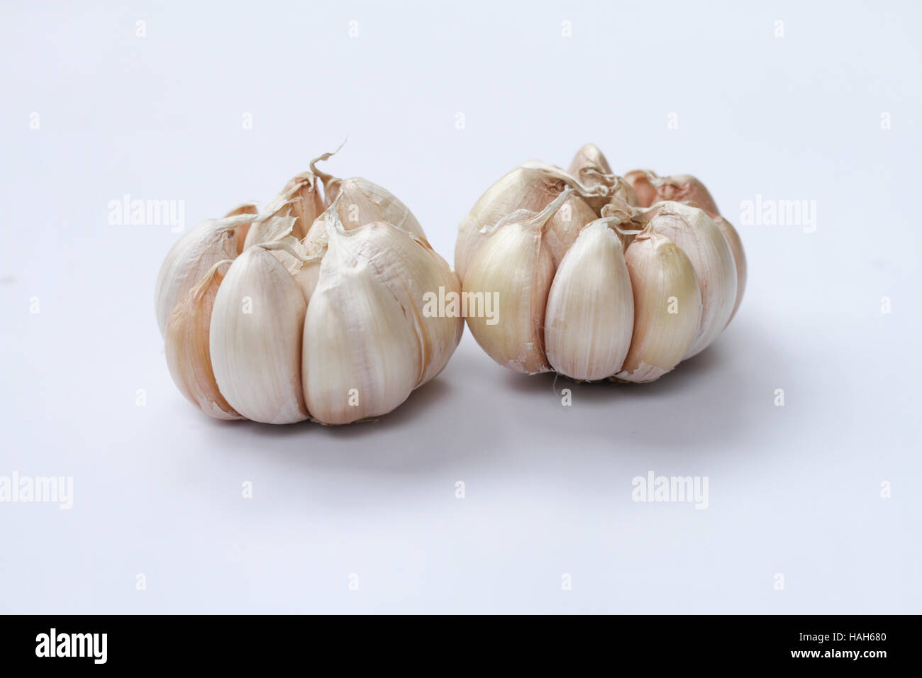 Fresh garlic isolated on white background Stock Photo - Alamy