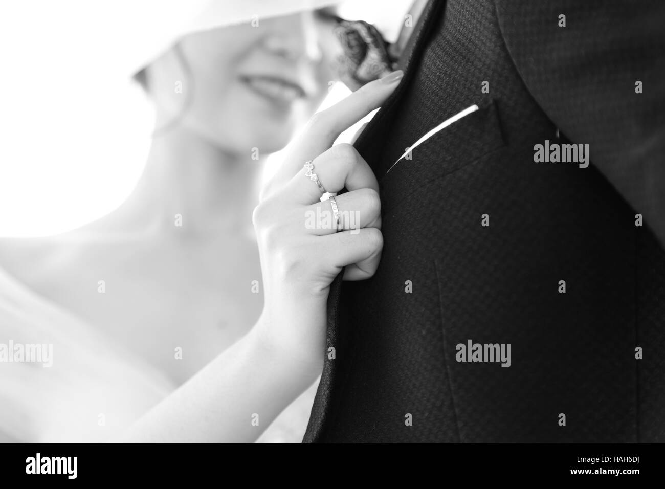 Wedding rings on hands Stock Photo Alamy