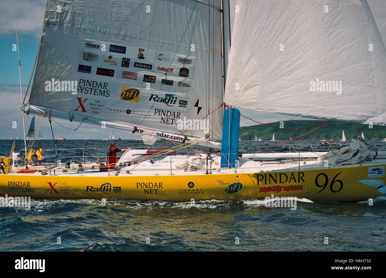 AJAXNETPHOTO. 4TH JUNE, 2000. PLYMOUTH, ENGLAND. - EUROPE 1 NEW MAN STAR TRANSAT YACHT RACE -  YACHT PINDAR SKIPPERED BY EMMA RICHARDS (GBR) AT THE START OF THE EUROPE 1 NEW MAN STAR SINGLE HANDED TRANSATLANTIC RACE.  PHOTO:TONY CARNEY/ACME/AJAX  REF:TC4924 2 2A Stock Photo