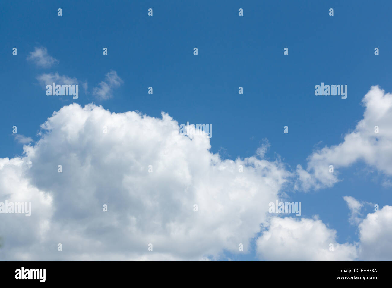 white clouds floating on a background of blue sky Stock Photo - Alamy