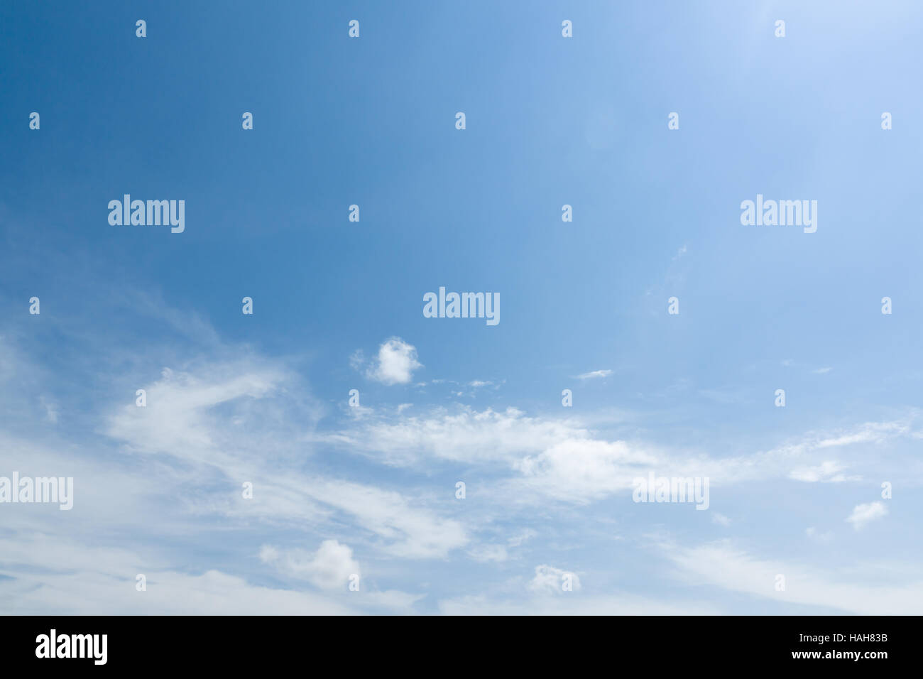 white clouds floating on a background of blue sky Stock Photo - Alamy