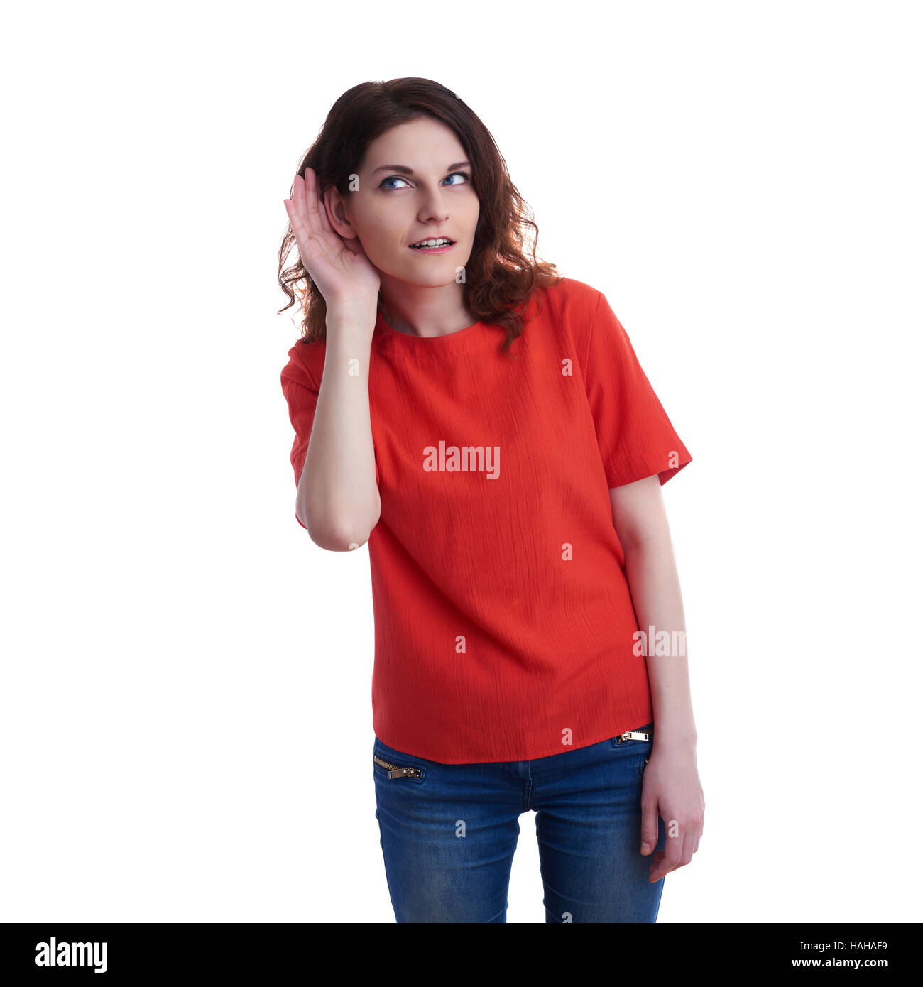 Smiling young woman over white isolated background Stock Photo - Alamy