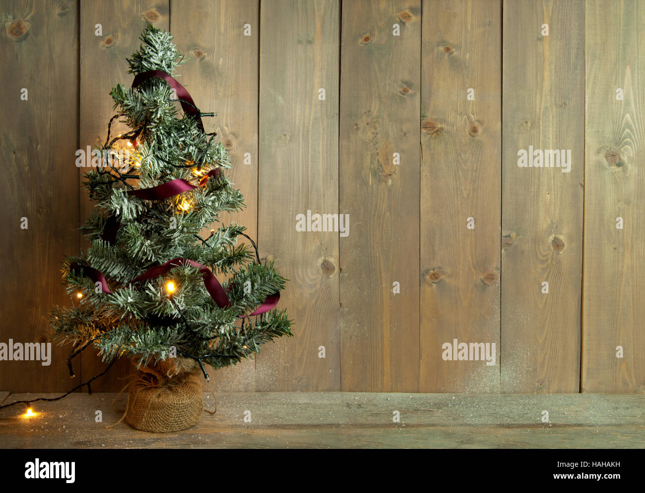 Christmas tree against wall hires stock photography and images Alamy