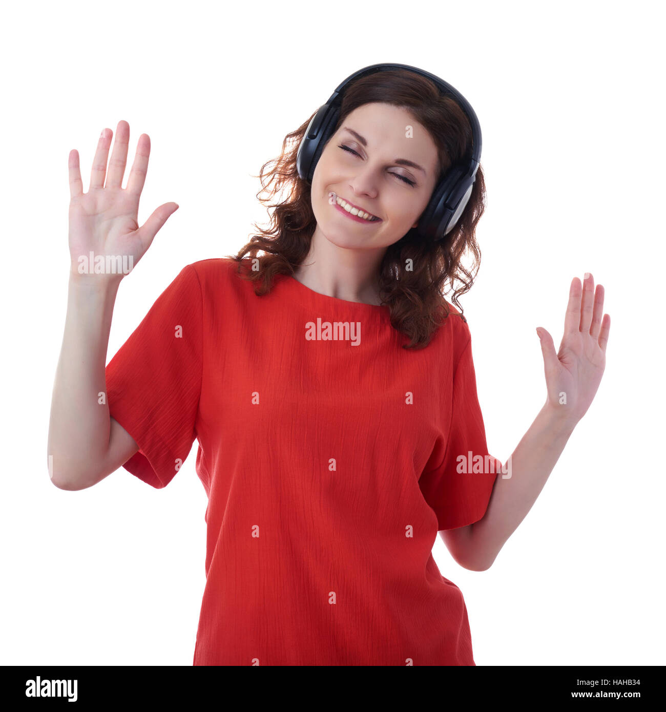 Smiling young woman over white isolated background Stock Photo - Alamy