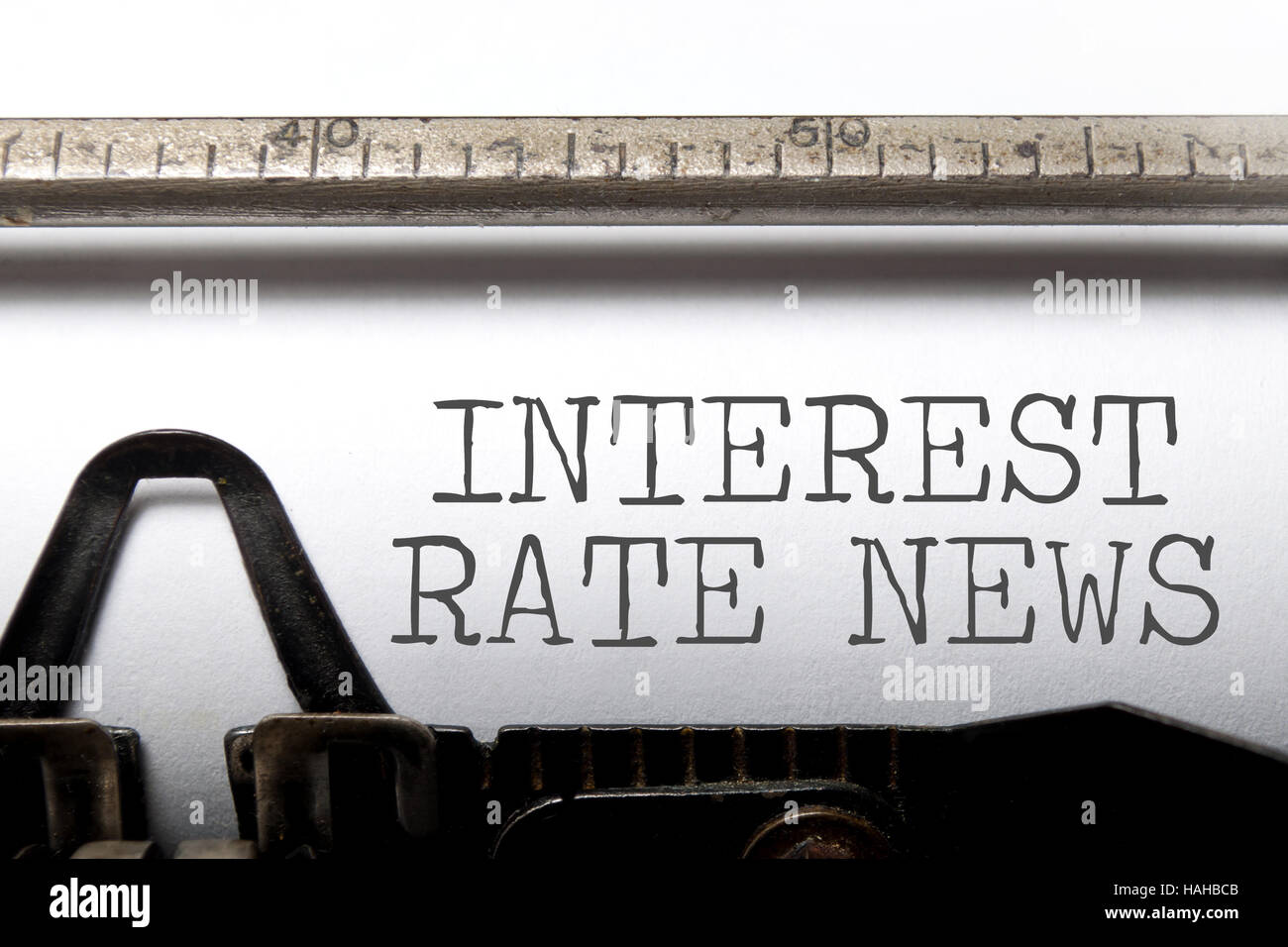 Interest rates headline printed on an old typewriter Stock Photo