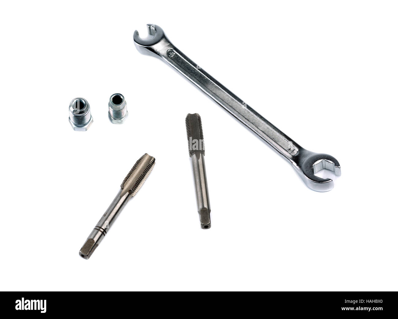 Wrench, tap thread and brake fitting, isolate on white Stock Photo