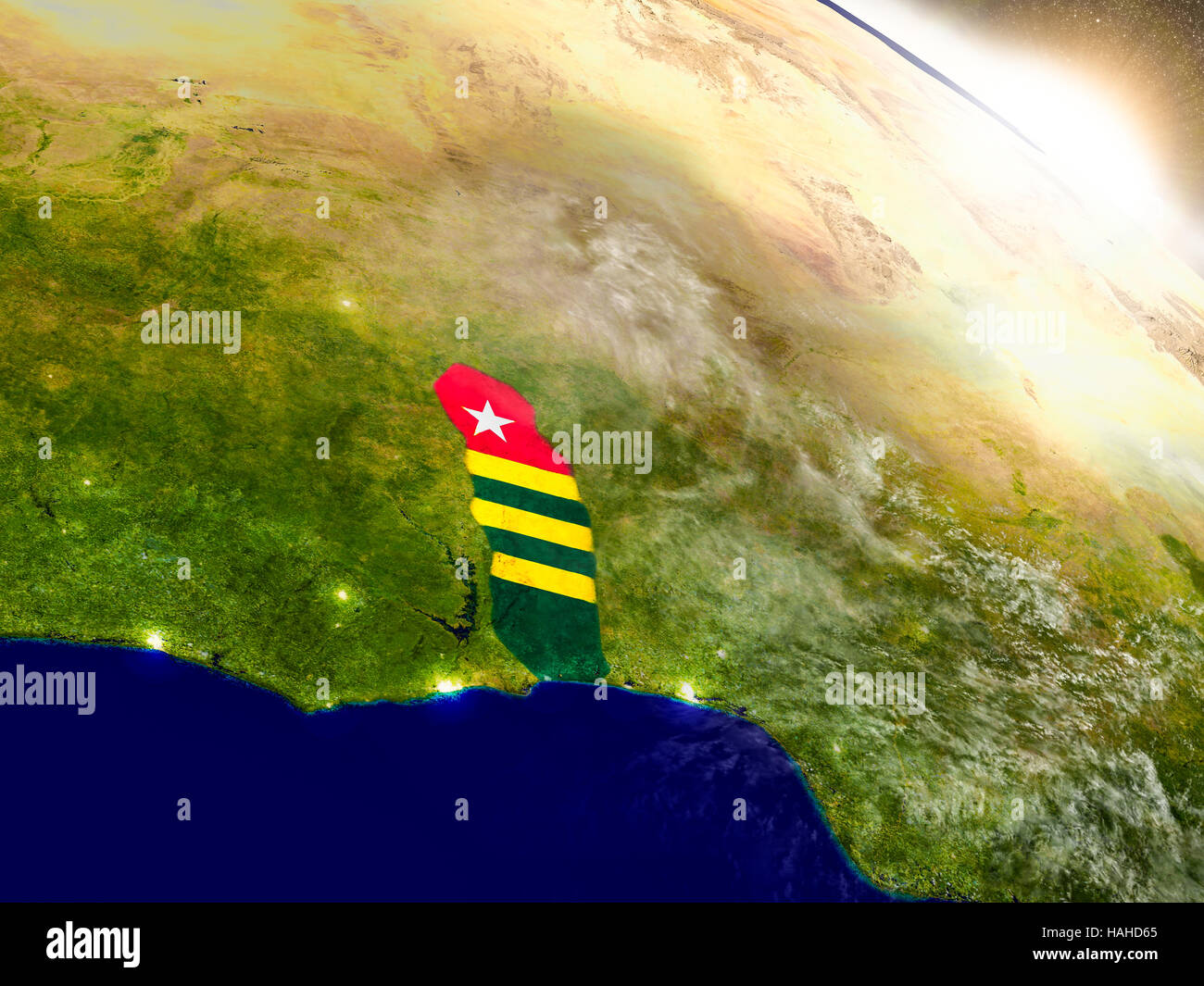 Togo with embedded flag on planet surface during sunrise. 3D ...