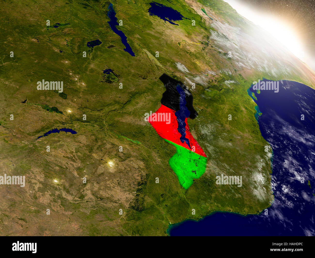 Malawi with embedded flag on planet surface during sunrise. 3D ...
