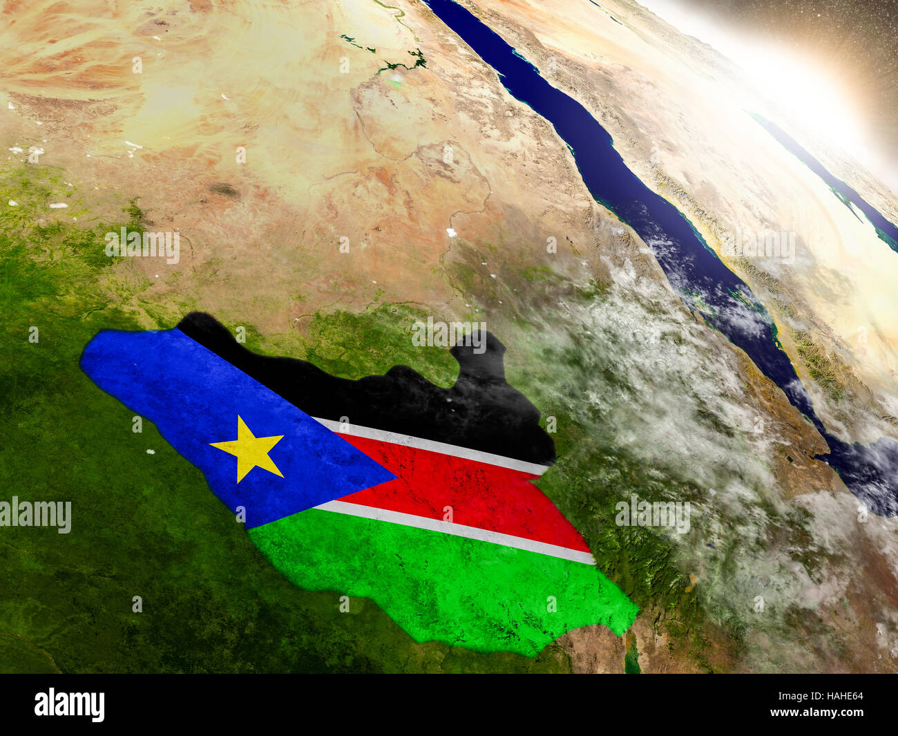 South Sudan with embedded flag on planet surface during sunrise. 3D ...