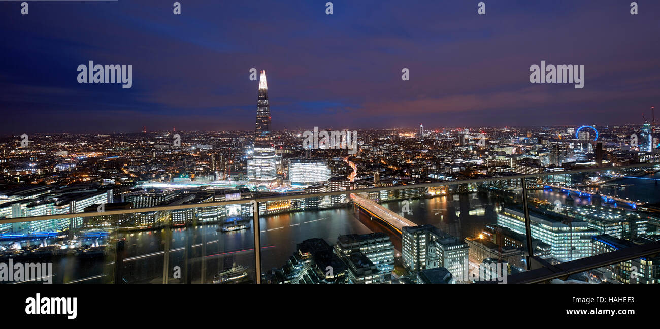 Panoramic view looking over London at dusk. Architectural Stock, Various, United Kingdom. Architect: n/a, 2016. Stock Photo