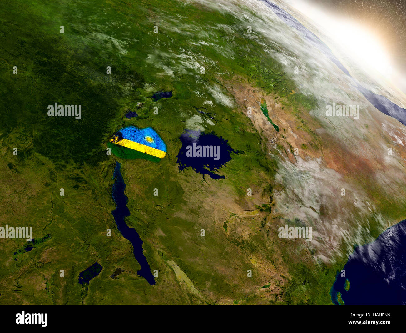 Rwanda with embedded flag on planet surface during sunrise. 3D ...