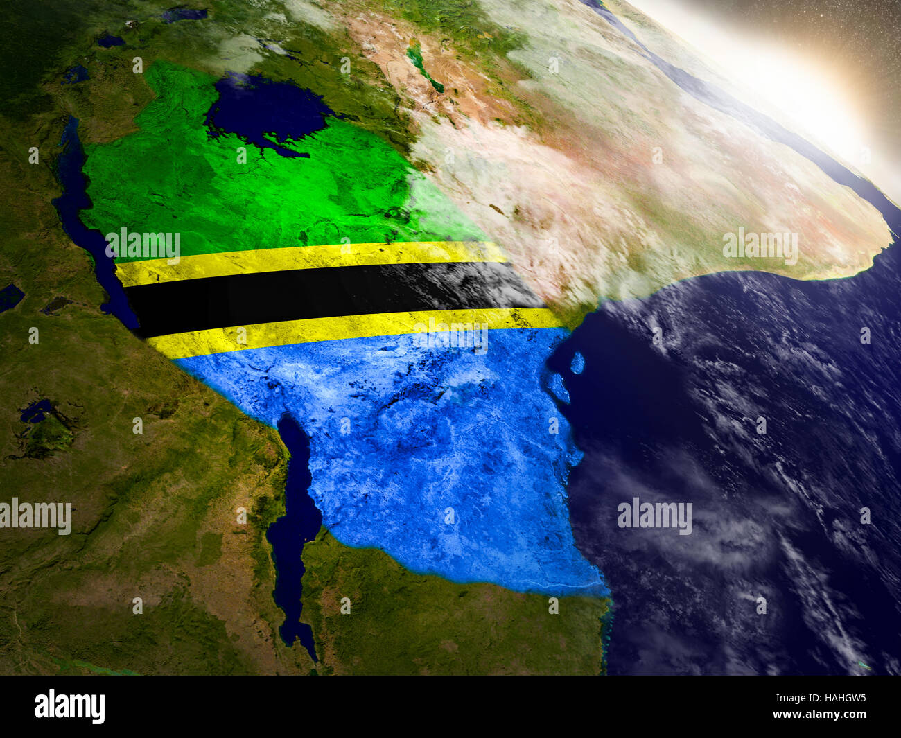Tanzania with embedded flag on planet surface during sunrise. 3D ...