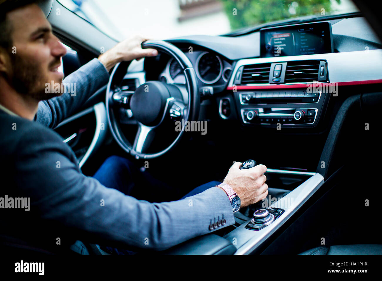 Young man driving in the  modern car Stock Photo