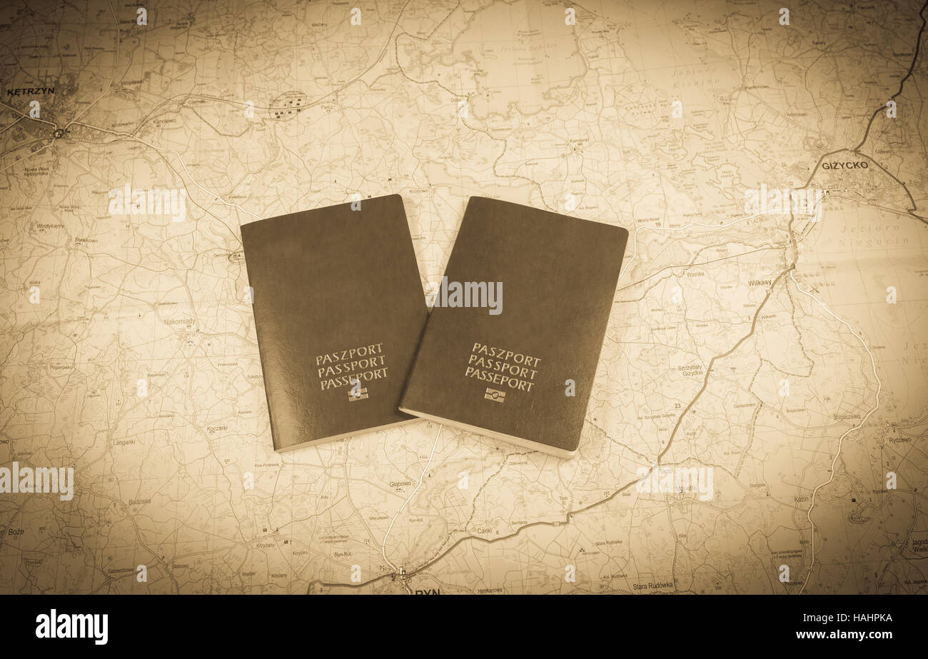 Two passports on a map, european country passports Stock Photo