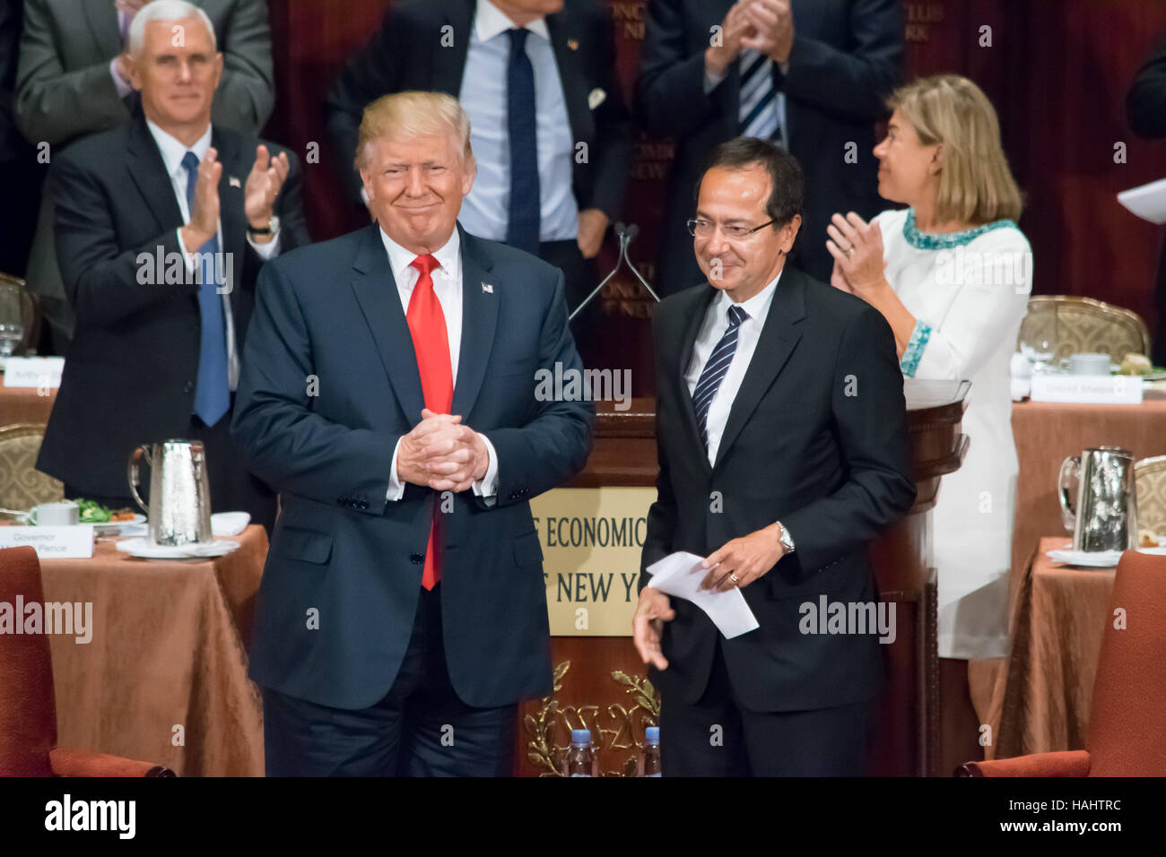 Donald Trump and John Paulson at the conclusion of a speech. Stock Photo