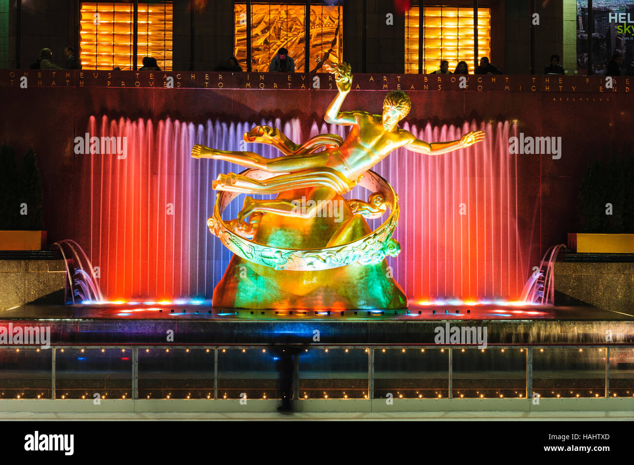Manhattan, Rockefeller Center, New York City, NY, USA - Prometheus Sculpture by Paul Mansing and fountain illuminated at night. Stock Photo