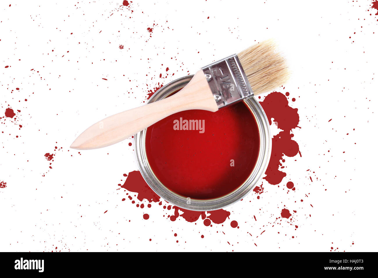 Red paint can with brush and color stains Stock Photo