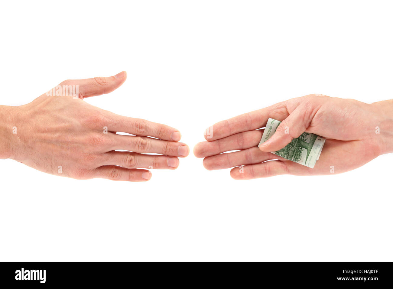 Corruption concept: hand giving bribe to other Stock Photo